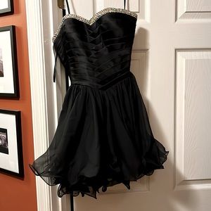 Size 0. La Femme, strapless short black dress with rhinestones.